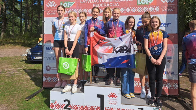 OK Kāpa, vidējā distance, zelts, W14