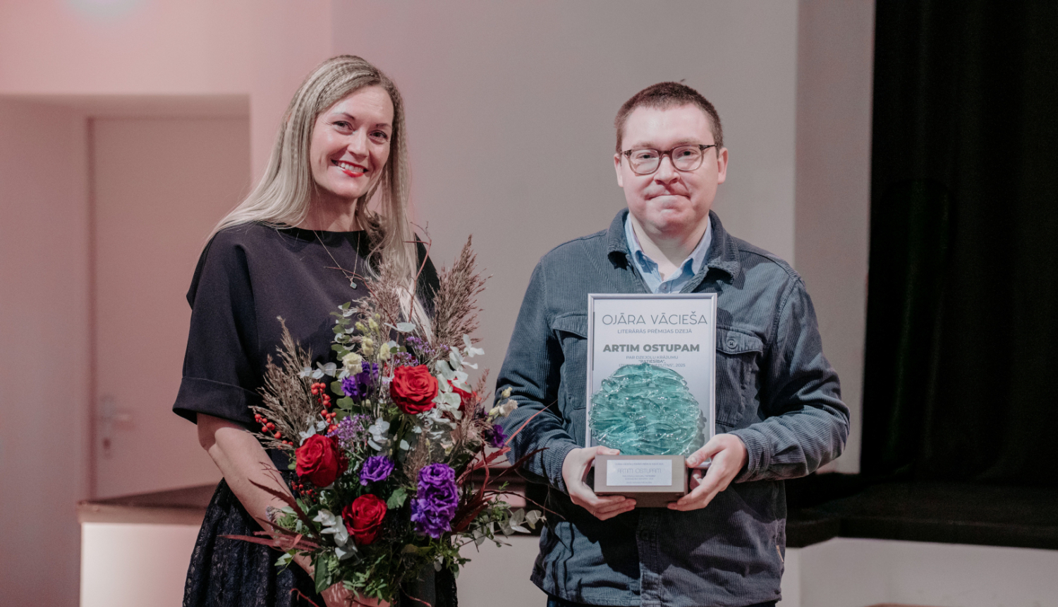 Karīna Miķelsone un Artis Ostups