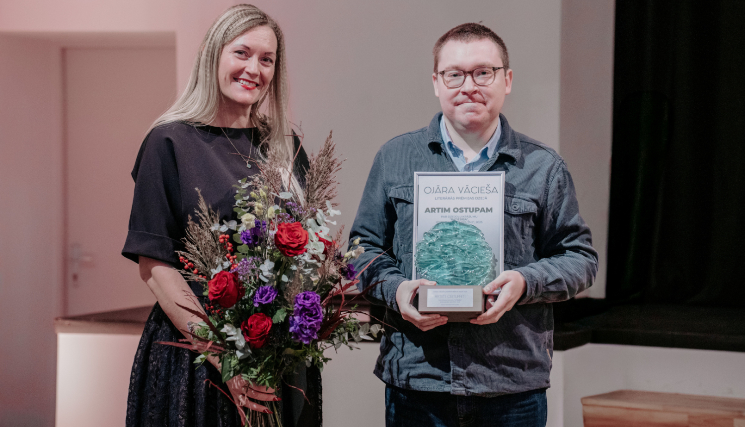 Karīna Miķelsone un Artis Ostups